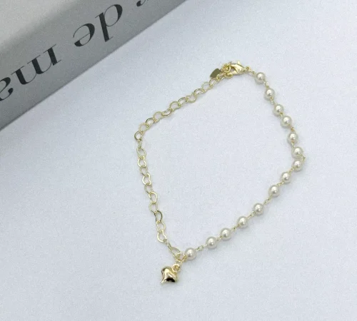 CAPA Pulseira metadinha dourada