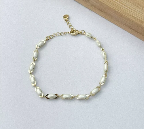 CAPA Pulseira pérola oval dourada